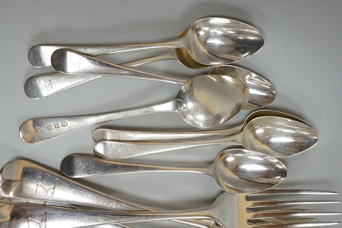 A harlequin part canteen of 19th century Old English pattern flatware, comprising thirty items, all with engraved crest, various dates and makers, 38.1oz.